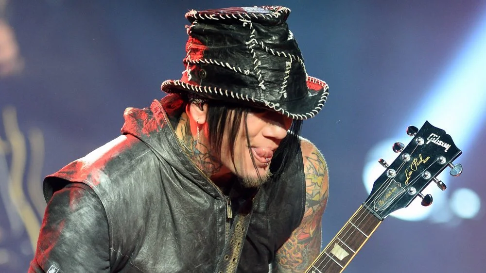 DJ Ashba playing guitar