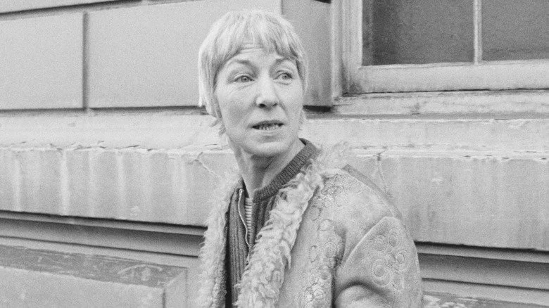 Anne Beverley being photographed