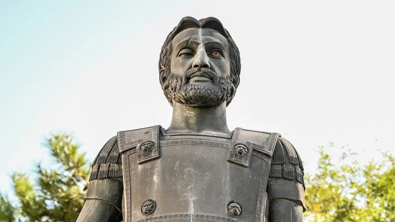 statue of Philip II of Macedon in armor and with a glass eye