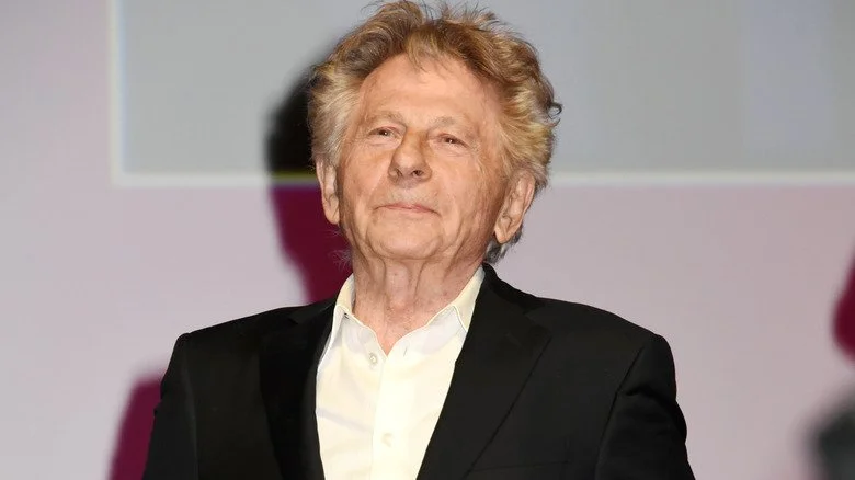 Roman Polanski posant pour une photo