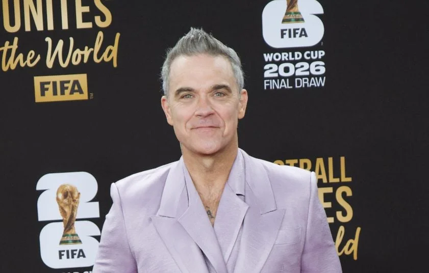 Robbie Williams vise détrôner les Beatles à la tête des charts