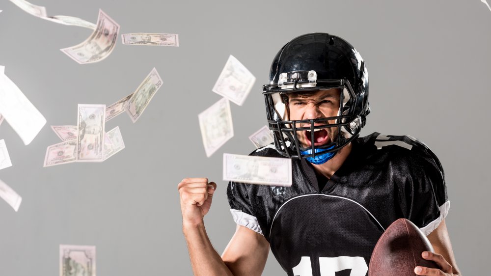 argent et ballon de football