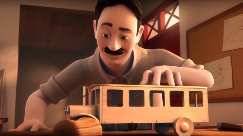 Ole avec un camion en bois