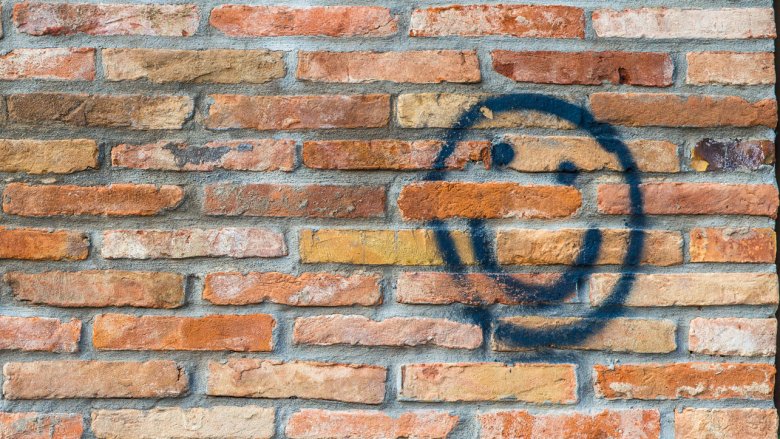 Serial killer, smiley face, wall