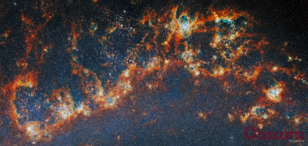 Détail d’un bras spiral de la galaxie M51 montrant des régions de formation stellaire observées par Webb et Hubble